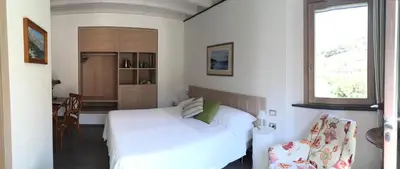 Letto o letti in una camera di La Casa di Andrea Relais