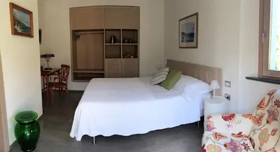 Letto o letti in una camera di La Casa di Andrea Relais