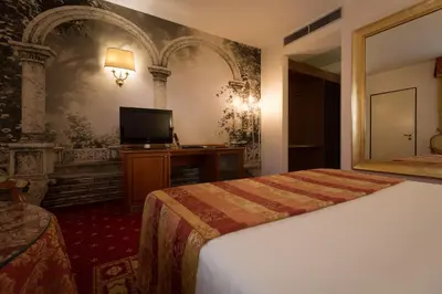 Letto o letti in una camera di Hotel Motel Del Duca-Pavia