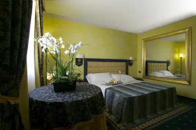 Letto o letti in una camera di Hotel Motel Del Duca-Pavia