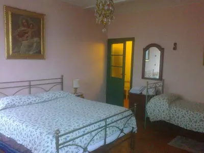 Letto o letti in una camera di Agriturismo Antica Golena