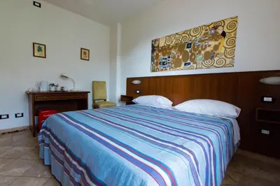 Letto o letti in una camera di B&B La Bredia