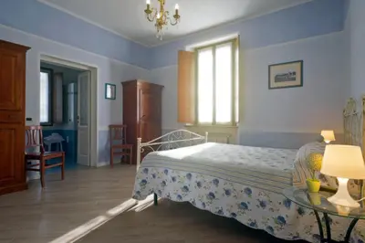 Letto o letti in una camera di Villa Dircea