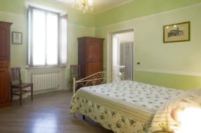 Letto o letti in una camera di Villa Dircea