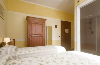 Letto o letti in una camera di Villa Dircea