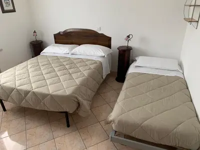 Letto o letti in una camera di Ca' Le Rose
