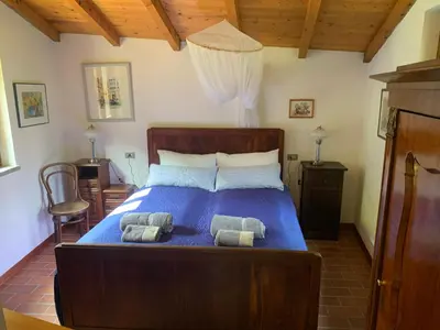 Letto o letti in una camera di Magic Mill Castagnetoli