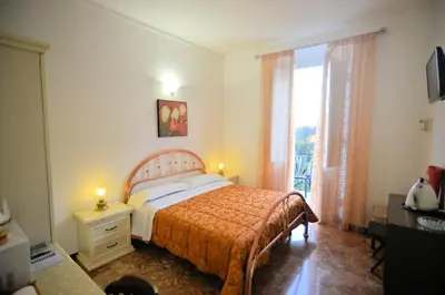 Letto o letti in una camera di Affittacamere Agata
