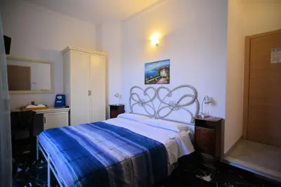 Letto o letti in una camera di Affittacamere Agata