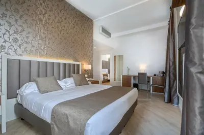 Letto o letti in una camera di Hotel Monte Rosa