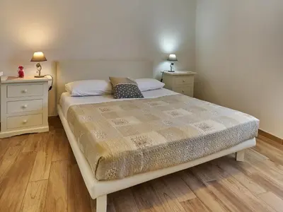 Letto o letti in una camera di Cà del fornello