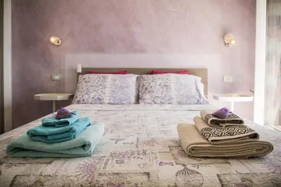 Letto o letti in una camera di Casa Patty vista Portofino