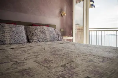 Letto o letti in una camera di Casa Patty vista Portofino