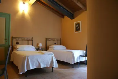 Letto o letti in una camera di B&B Sant'Antonio