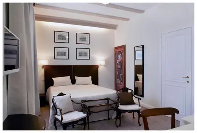 Letto o letti in una camera di Relais Torre Dei Torti - Luxury Bed and Breakfast