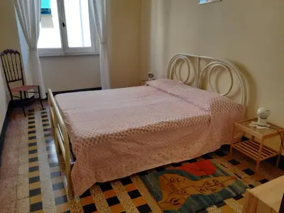 Letto o letti in una camera di Residenza dell'Orto