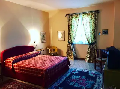 Letto o letti in una camera di Agriturismo Le Colombaie