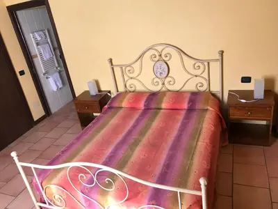 Letto o letti in una camera di Agriturismo Il Colore del Grano