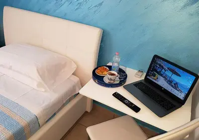 Letto o letti in una camera di Cristal Rooms