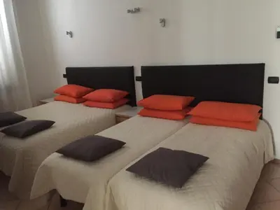Letto o letti in una camera di Da Battista