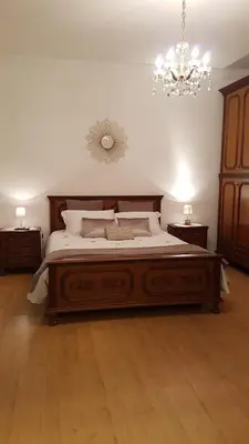 Letto o letti in una camera di Buio Pesto