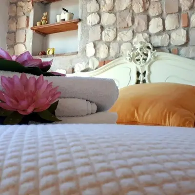 Letto o letti in una camera di Il Debbio