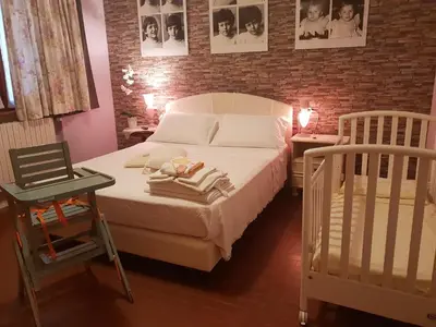 Letto o letti in una camera di B&B Family Home