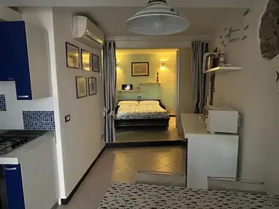 Letto o letti in una camera di Pippo Cosy flat Central with AC near beaches