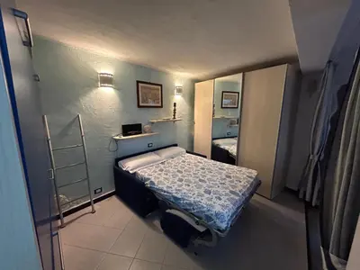 Letto o letti in una camera di Pippo Cosy flat Central with AC near beaches