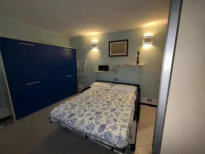 Letto o letti in una camera di Pippo Cosy flat Central with AC near beaches