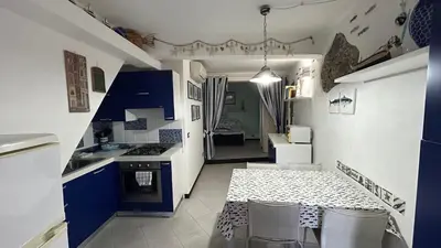 Cucina o angolo cottura di Pippo Cosy flat Central with AC near beaches