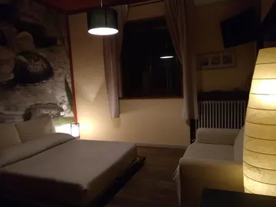 Letto o letti in una camera di B&B CountryHouseAnna