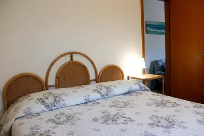 Letto o letti in una camera di Primario