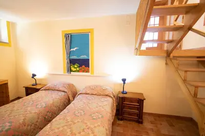 Letto o letti in una camera di Le Case di Petra