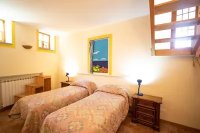 Letto o letti in una camera di Le Case di Petra