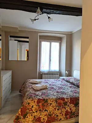 Letto o letti in una camera di La Merlettaia