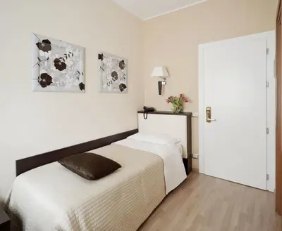 Letto o letti in una camera di Hotel Aurora
