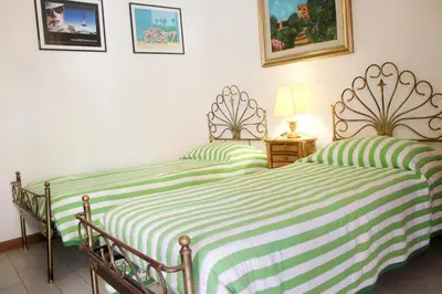 Letto o letti in una camera di Appartamento Primula Rossa