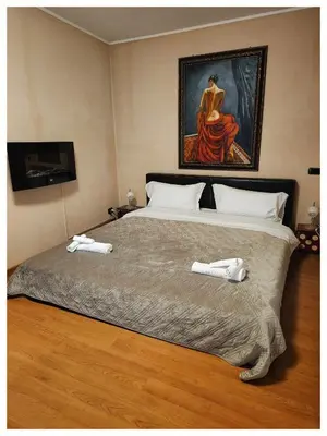 Letto o letti in una camera di Villa Marisa