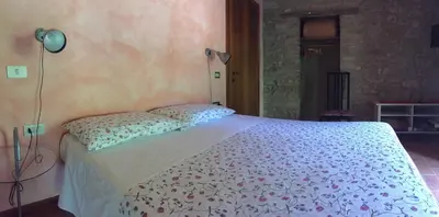 Letto o letti in una camera di Agriturismo Spizzirò
