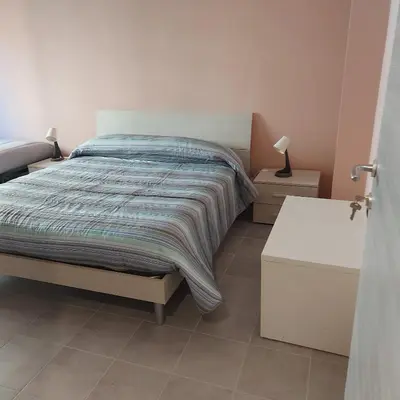 Letto o letti in una camera di FARE BnB - Room & Breakfast Santa Maria