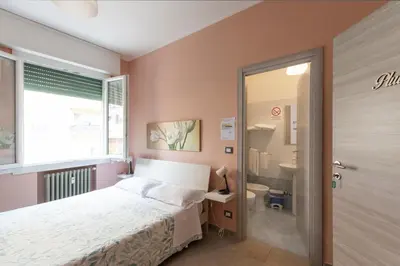 Letto o letti in una camera di FARE BnB - Room & Breakfast Santa Maria