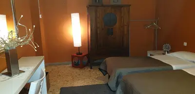 Letto o letti in una camera di Agorà Residenza