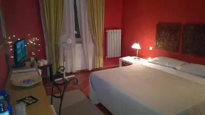 Letto o letti in una camera di Agorà Residenza