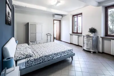 Letto o letti in una camera di Cascina La Goliarda