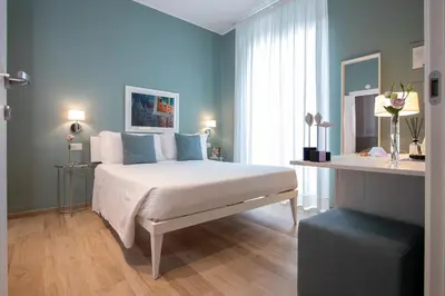 Letto o letti in una camera di Blu Hotel