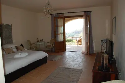 Letto o letti in una camera di Hotel Podere Conti
