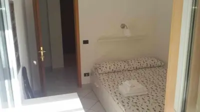 Letto o letti in una camera di La casetta di Sofia