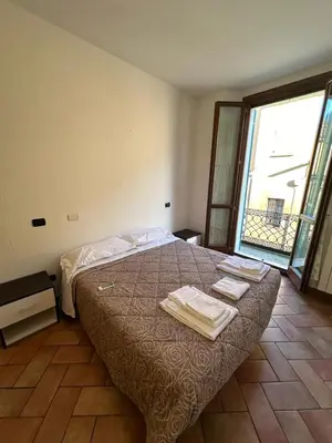 Letto o letti in una camera di Aselli Palace