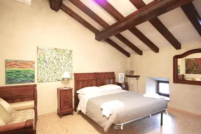 Letto o letti in una camera di Casa del Pittore